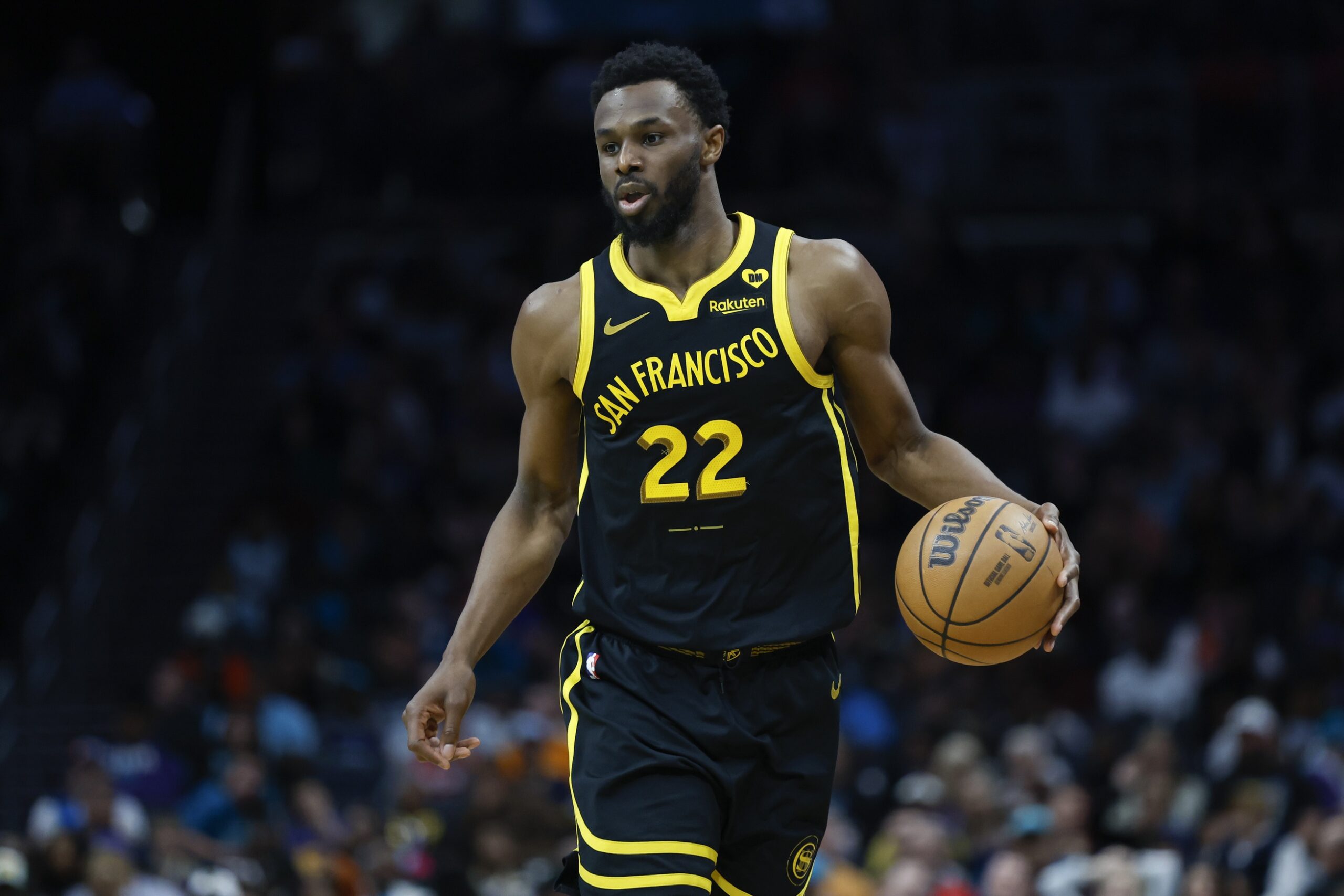 Golden State Warriors wing Andrew Wiggins (22) brings the ball up