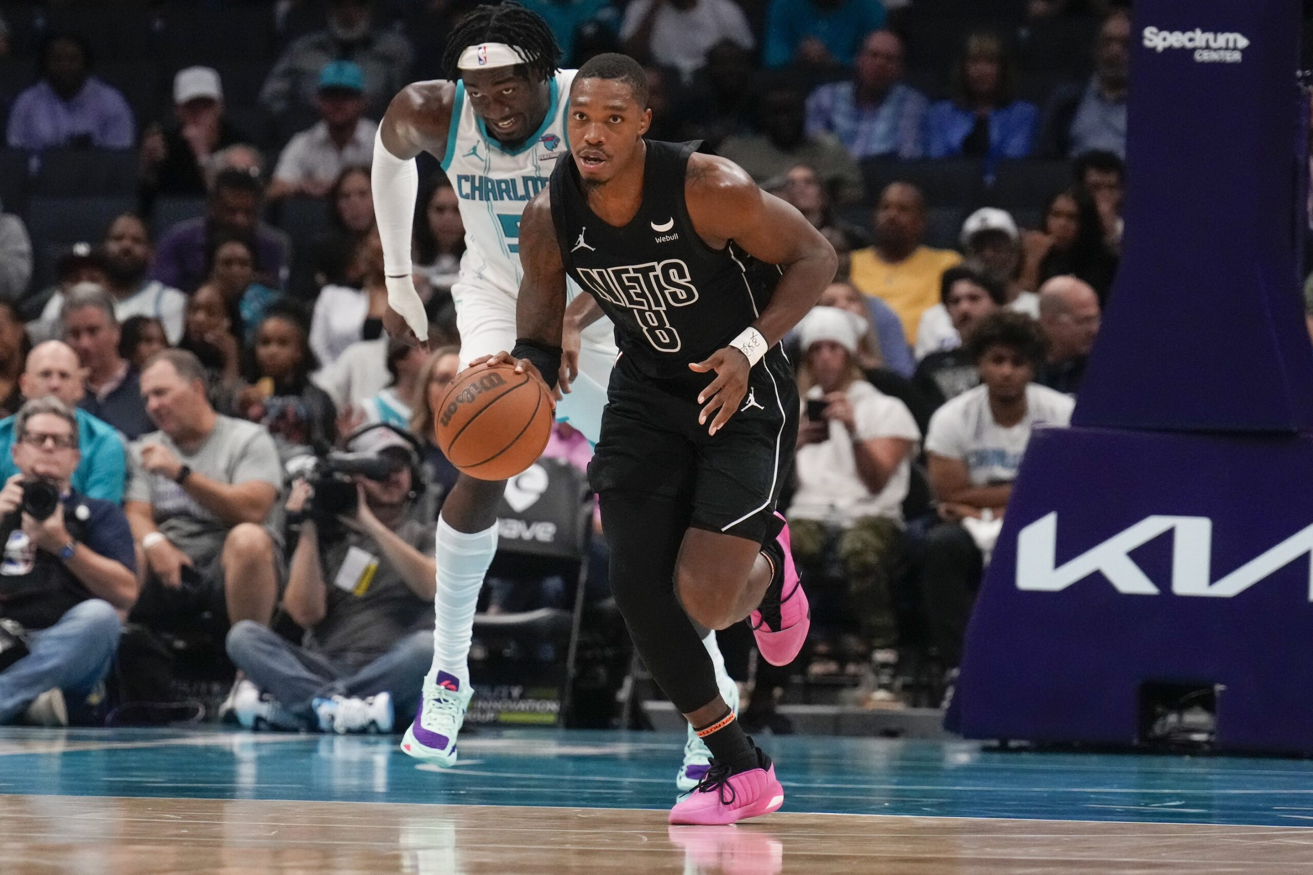 Oct 30, 2023; Charlotte, North Carolina, USA; Brooklyn Nets guard Lonnie Walker IV (8) brings the ball up court against the Charlotte Hornets during the second half at Spectrum Center. Mandatory Credit: Jim Dedmon-USA TODAY Sports