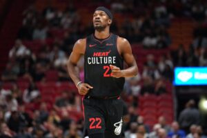 Nov 16, 2023; Miami, Florida, USA; Miami Heat forward Jimmy Butler (22) makes his way up the court against the Brooklyn Nets in the first half at Kaseya Center. Mandatory Credit: Jim Rassol-USA TODAY Sports