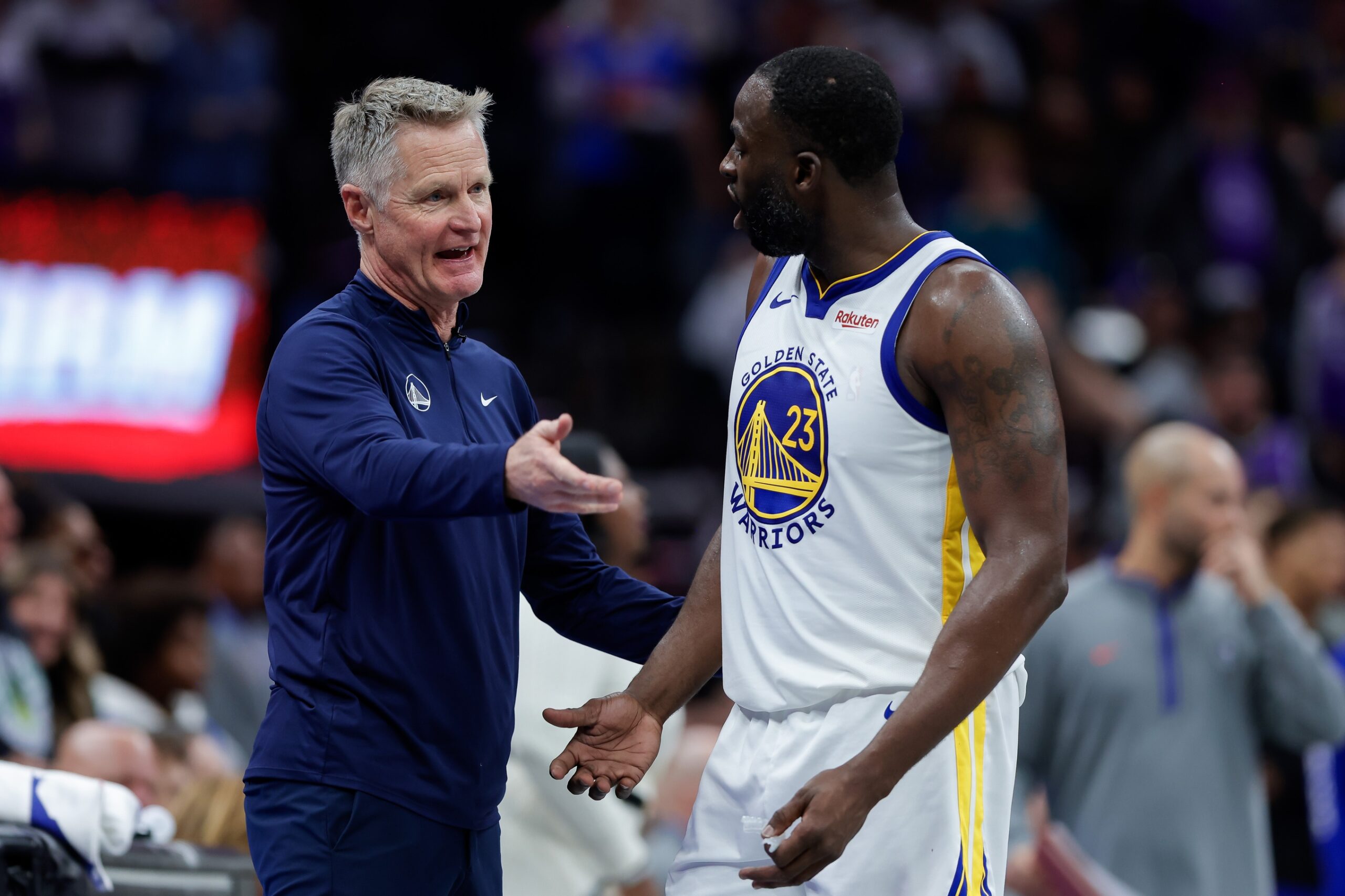 Golden State Warriors head coach Steve Kerr speaks to veteran forward Draymond Green