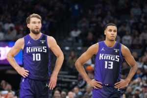 December 16, 2023; Sacramento, California, USA; Sacramento Kings forward Domantas Sabonis (10) and forward Keegan Murray (13) during the first quarter against the Utah Jazz at Golden 1 Center. Mandatory Credit: Kyle Terada-USA TODAY Sports