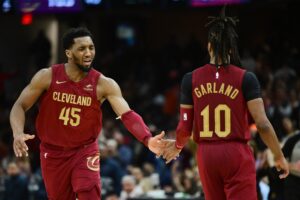 Cleveland Cavaliers guard Donovan Mitchell (45) celebrates with guard Darius Garland (10) during the second half against the Chicago Bulls at Rocket Mortgage FieldHouse.