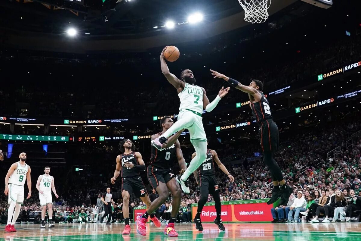 Mar 18, 2024; Boston, Massachusetts, USA; Boston Celtics guard Jaylen Brown (7) shoots the ball against Detroit Pistons guard Jaden Ivey (23) in the second quarter at TD Garden. Mandatory Credit: David Butler II-USA TODAY Sports