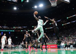 Mar 18, 2024; Boston, Massachusetts, USA; Boston Celtics guard Jaylen Brown (7) shoots the ball against Detroit Pistons guard Jaden Ivey (23) in the second quarter at TD Garden. Mandatory Credit: David Butler II-USA TODAY Sports