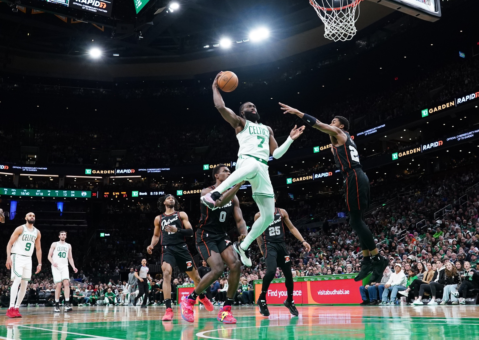 Mar 18, 2024; Boston, Massachusetts, USA; Boston Celtics guard Jaylen Brown (7) shoots the ball against Detroit Pistons guard Jaden Ivey (23) in the second quarter at TD Garden. Mandatory Credit: David Butler II-USA TODAY Sports