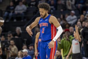 Detroit Pistons guard Cade Cunningham (2) celebrates after making a three point shot against the Minnesota Timberwolves in the first half at Target Center.