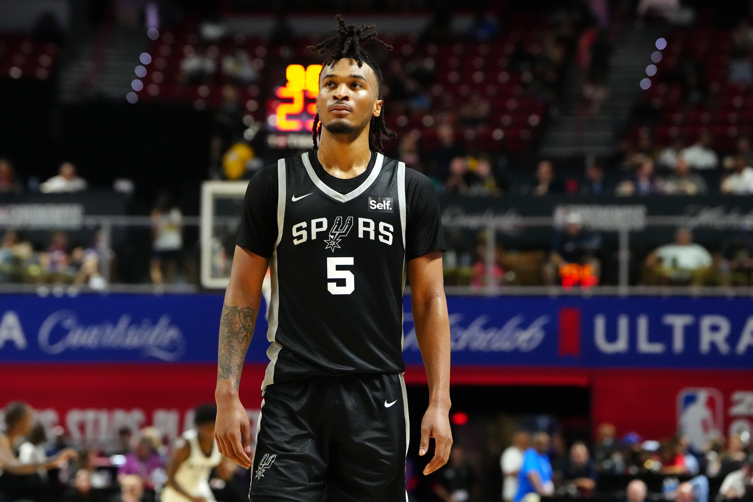 San Antonio Spurs guard Stephon Castle (5) walks up court during the third quarter against the Portland Trail Blazers at Thomas & Mack Center.