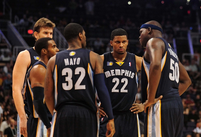 Nov. 5 2010; Phoenix, AZ, USA; Memphis Grizzlies forward Rudy Gay (22), talks with forward Zach Randolph (50), guard O.J. Mayo (32), guard Mike Conley (second from left), and center Marc Gasol (far left) on the court against the Phoenix Suns at the US Airways Center. The Suns defeated the Memphis Grizzlies in double over time 123 - 118. Mandatory Credit: Jennifer Stewart-Imagn Images