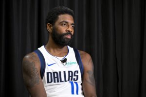 Dallas Mavericks guard Kyrie Irving (11) is interviewed during the 2024 Dallas Mavericks media day