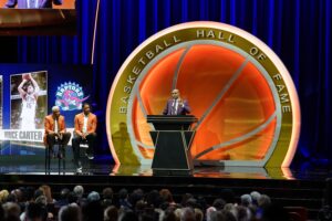 Basketball Hall of Fame Class of 2024 inductee Vince Carter speaks alongside presenters Julius Erving (1993) and Tracy McGrady (2017)