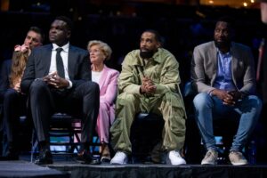 Former Memphis Grizzlies players Zach Randolph, Mike Conley and Tony Allen listen as Marc Gasol speaks