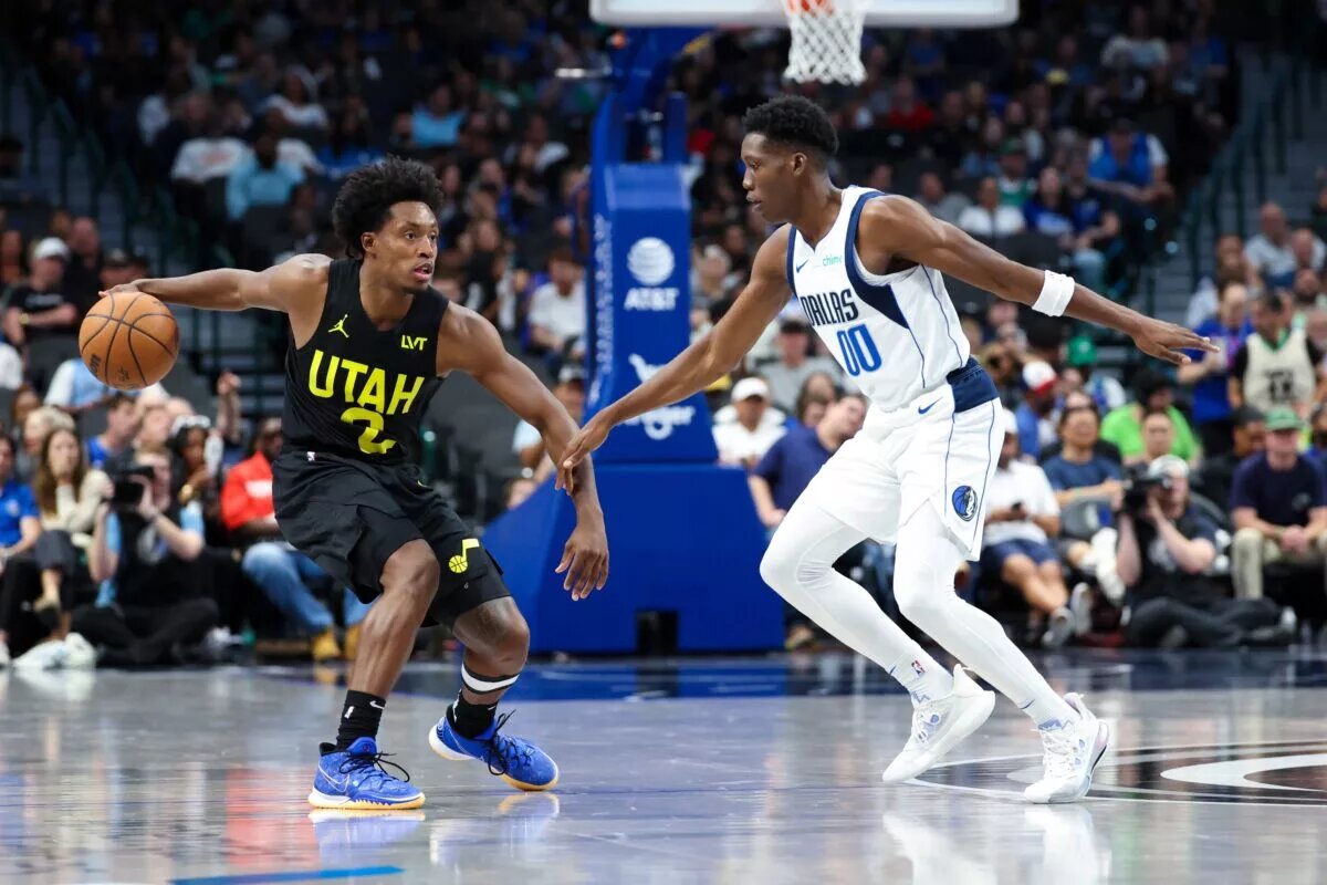 Jazz guard Collin Sexton (2) dribbles as Dallas Mavericks guard Jazian Gortman (00) defends