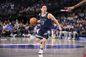 Memphis Grizzlies guard Yuki Kawamura (17) brings the ball up court