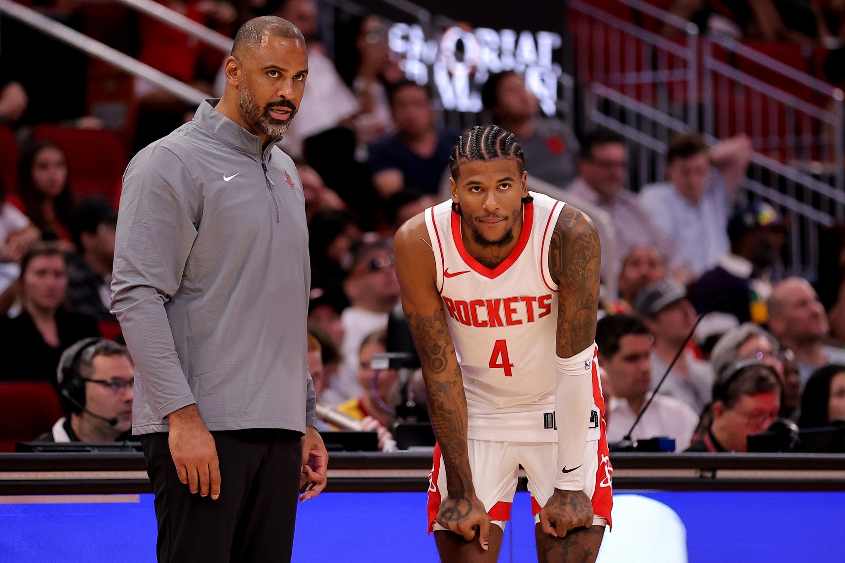 Houston Rockets head coach Ime Udoka talks with guard Jalen Green (4)