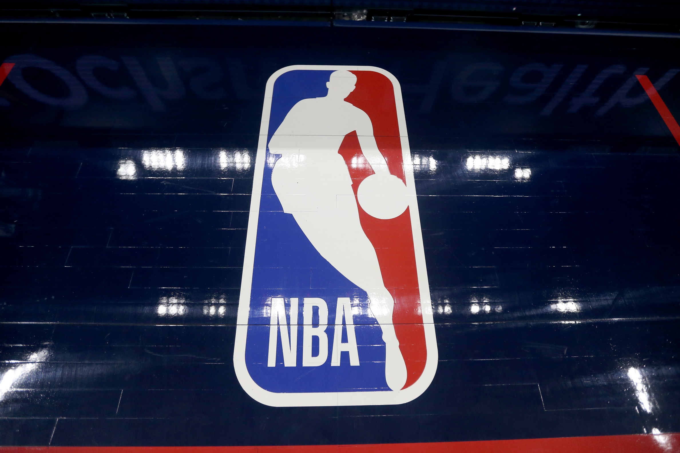 The NBA logo on the floor before the game between the New Orleans Pelicans and the Golden State Warriors