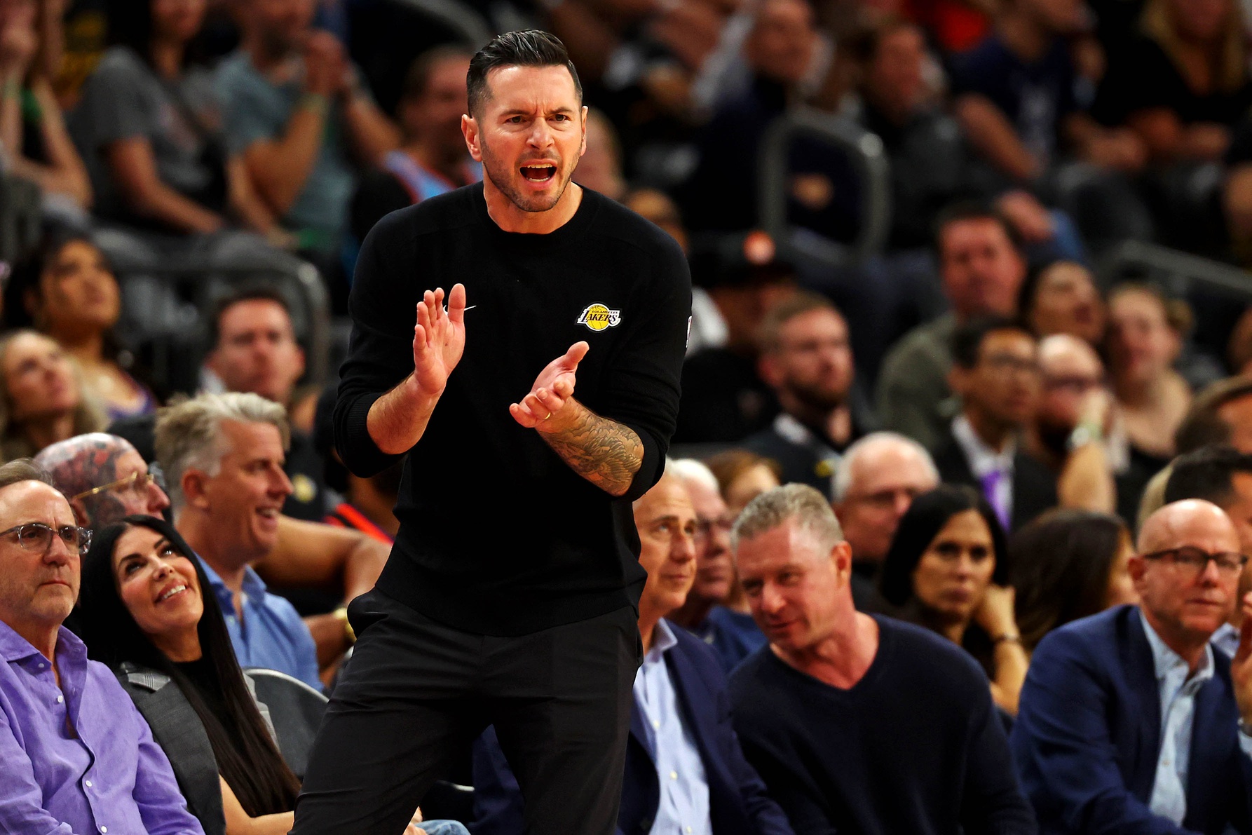 Oct 28, 2024; Phoenix, Arizona, USA; Los Angeles Lakers head coach JJ Redick cheers on his team during the second half against the Phoenix Suns at Footprint Center. Mandatory Credit: Mark J. Rebilas-Imagn Images