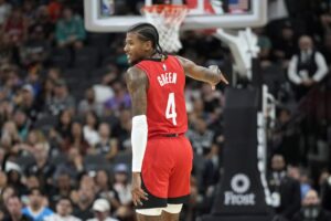 Houston Rockets guard Jalen Green (4) reacts after scoring a three-point basket