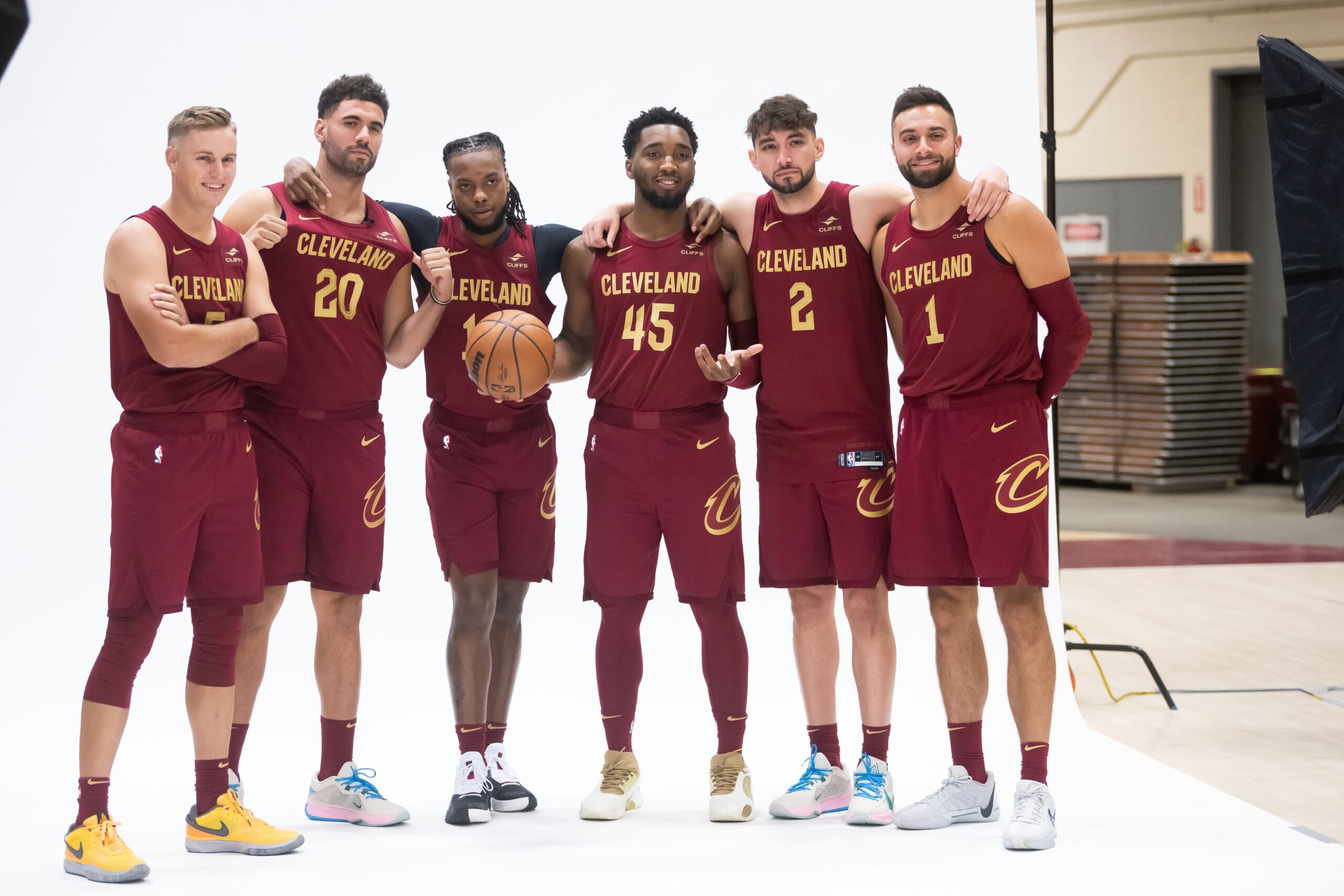 Oct 2, 2023; Cleveland, OH, USA; Cleveland Cavaliers guard Sam Merrill (5) and forward Georges Niang (20) and guard Darius Garland (10) and guard Donovan Mitchell (45) and guard Ty Jerome (2) and guard Max Strus (1) pose for a photo during media day at Rocket Mortgage FieldHouse. Mandatory Credit: Ken Blaze-USA TODAY Sports