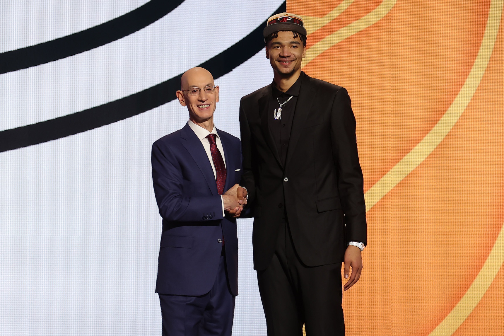 Jun 26, 2024; Brooklyn, NY, USA; Kel'el Ware poses for photos with NBA commissioner Adam Silver after being selected in the first round by the Miami Heat in the 2024 NBA Draft at Barclays Center. Mandatory Credit: Brad Penner-USA TODAY Sports