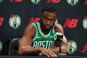 Sep 24, 2024; Boston, MA, USA; Boston Celtics guard Jaylen Brown (7) talks to reporters during media day at Auerbach Center. Mandatory Credit: David Butler II-Imagn Images