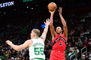 Oct 13, 2024; Boston, Massachusetts, USA; Toronto Raptors forward Scottie Barnes (4) shoots the ball over Boston Celtics forward Baylor Scheierman (55) during the second half at TD Garden. Mandatory Credit: Bob DeChiara-Imagn Images