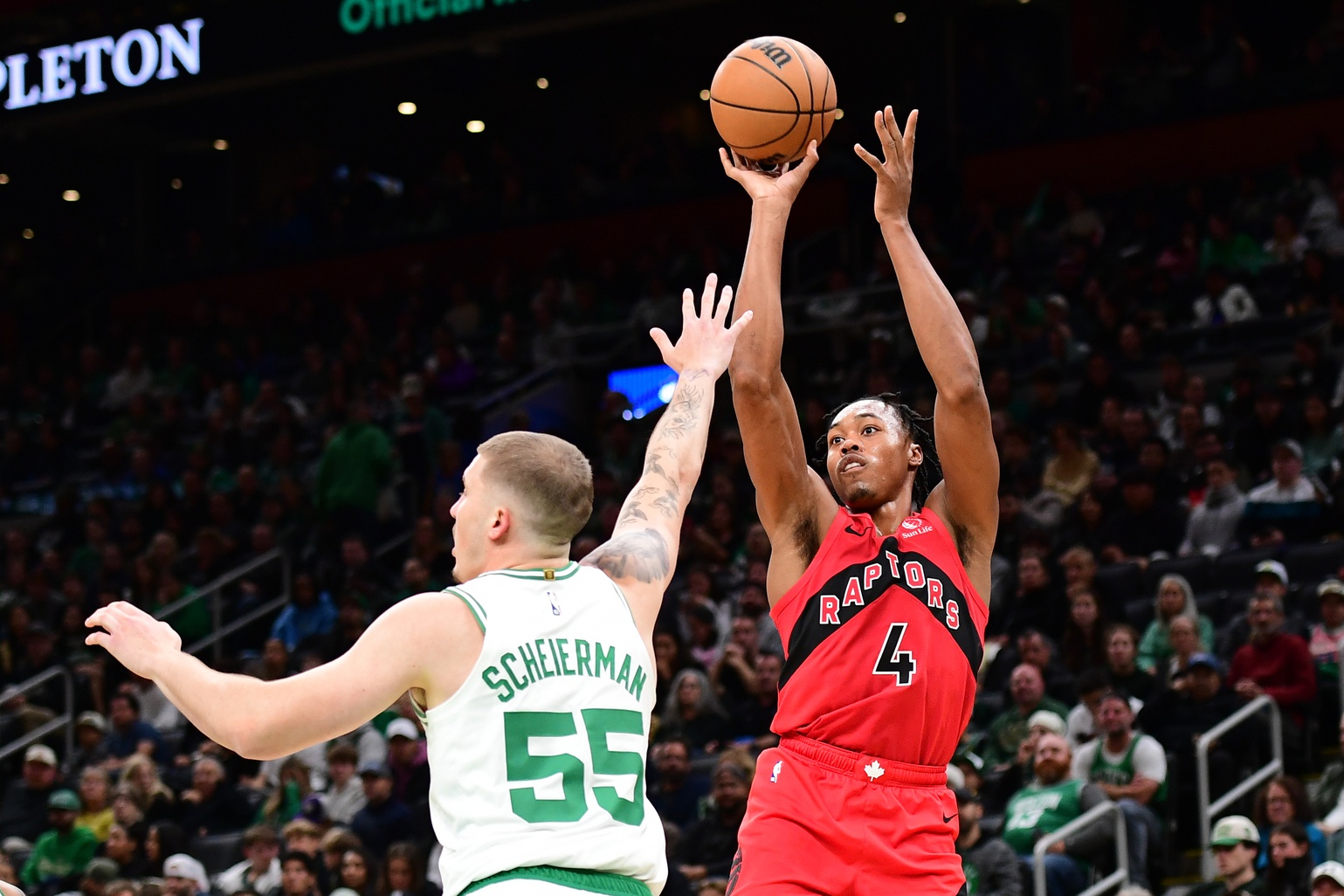 Oct 13, 2024; Boston, Massachusetts, USA; Toronto Raptors forward Scottie Barnes (4) shoots the ball over Boston Celtics forward Baylor Scheierman (55) during the second half at TD Garden. Mandatory Credit: Bob DeChiara-Imagn Images