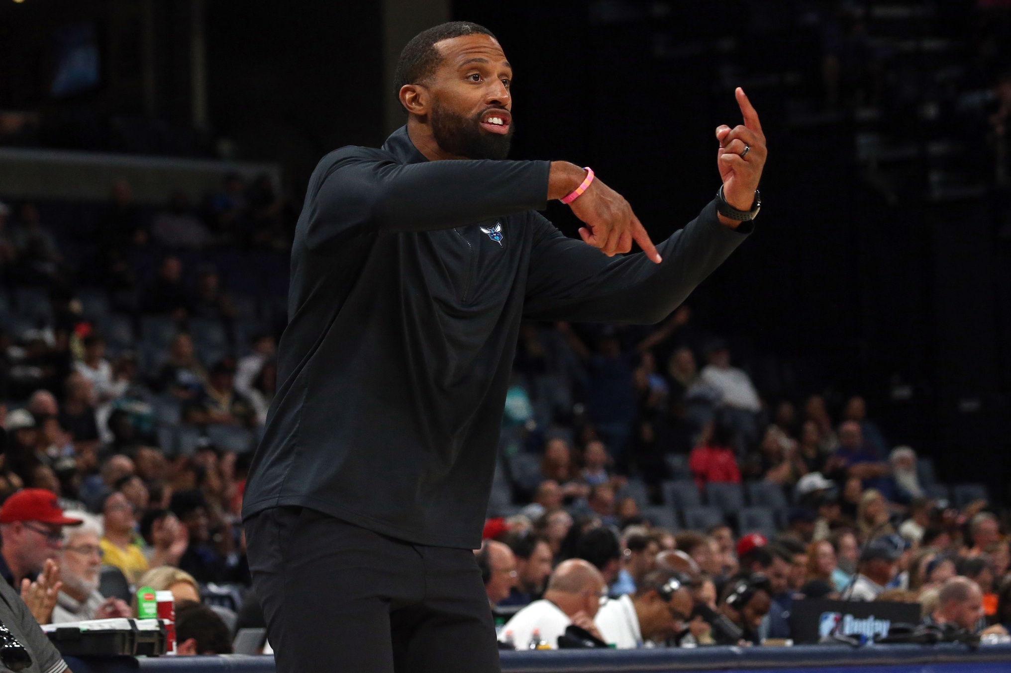 Oct 10, 2024; Memphis, Tennessee, USA; Charlotte Hornets head coach Charles Lee gives direction during the second half against the Memphis Grizzlies at FedExForum. Mandatory Credit: Petre Thomas-Imagn Images Taj Gibson