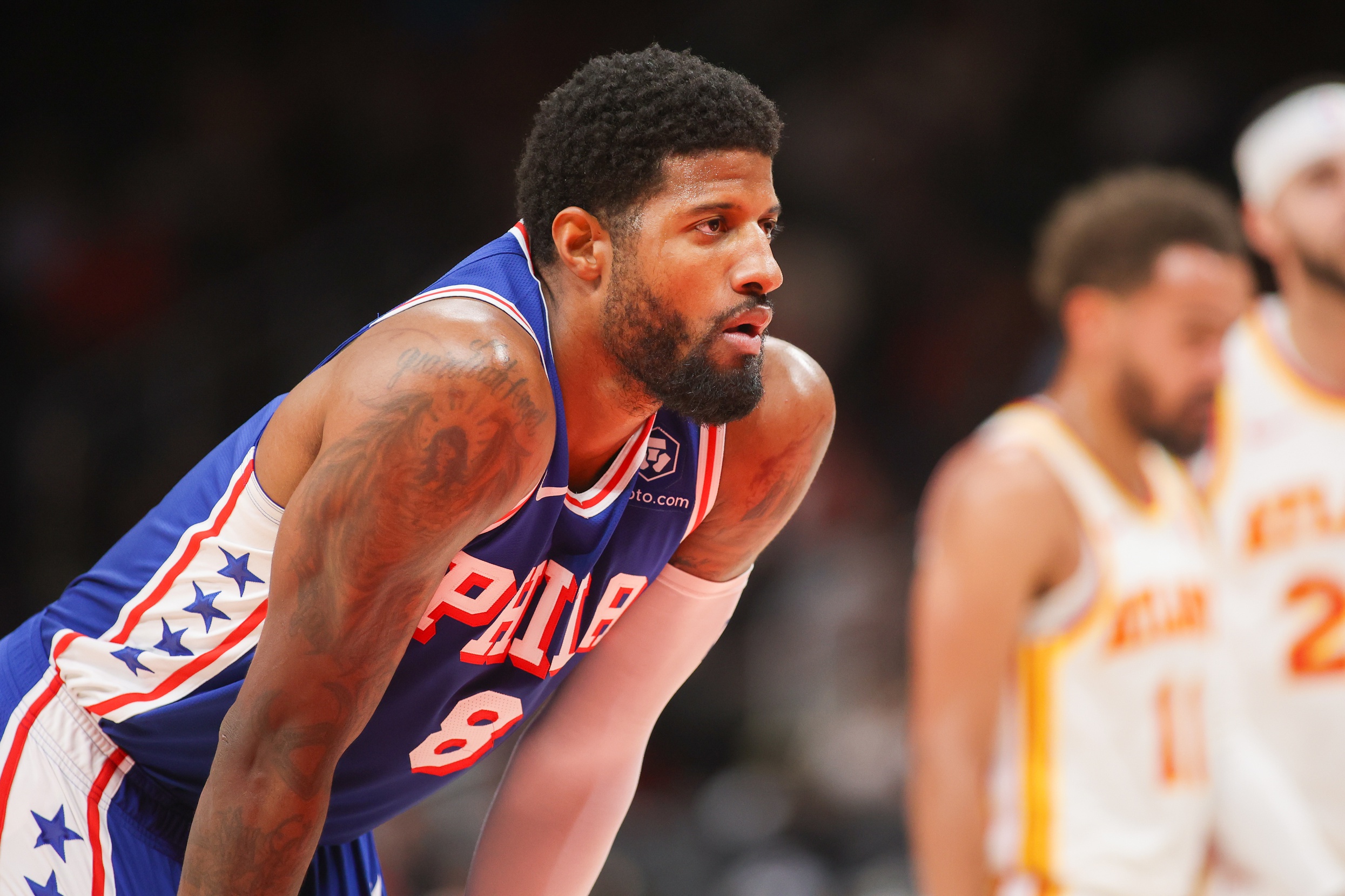 Paul George's early season injury threatens the 76ers' season and title chances.