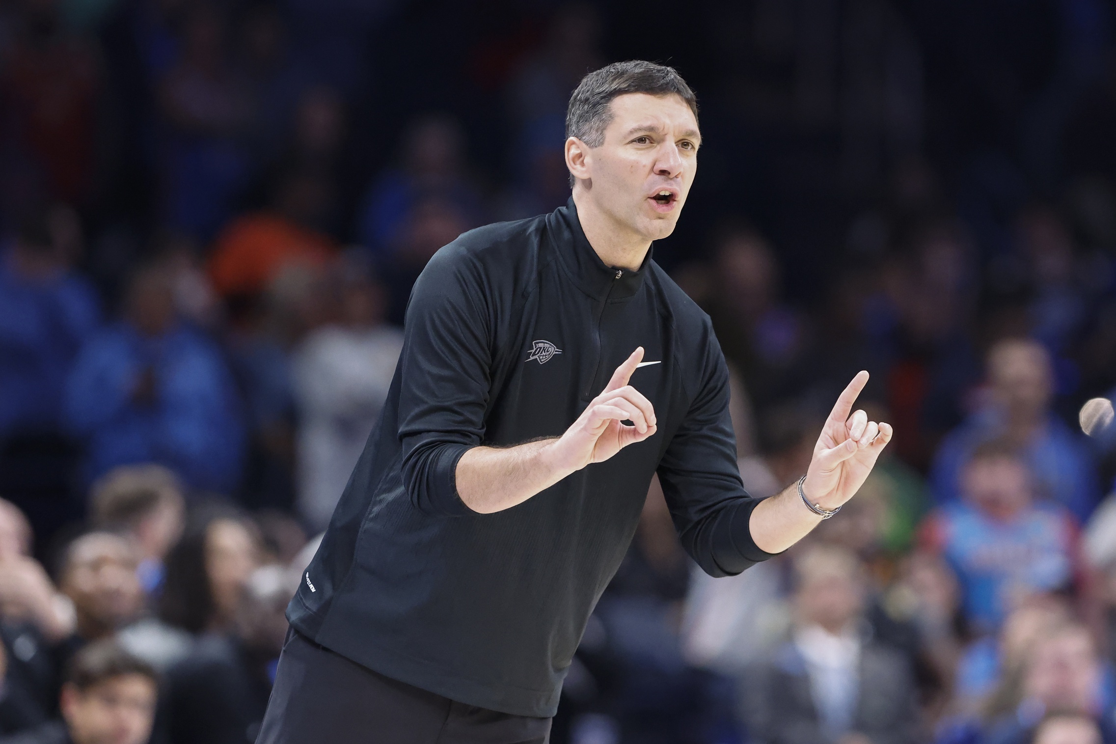 Oklahoma City Thunder head coach Mark Daigneault gestures to his team during a play against the Atlanta Hawks in the second half at Paycom Center.