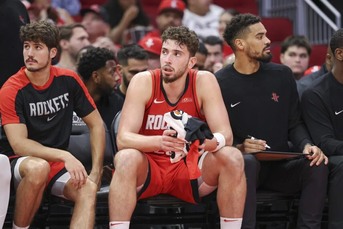 Houston Rockets center Alperen Sengun (28) reacts from the bench during the fourth quarter against the Charlotte Hornets at Toyota Center.