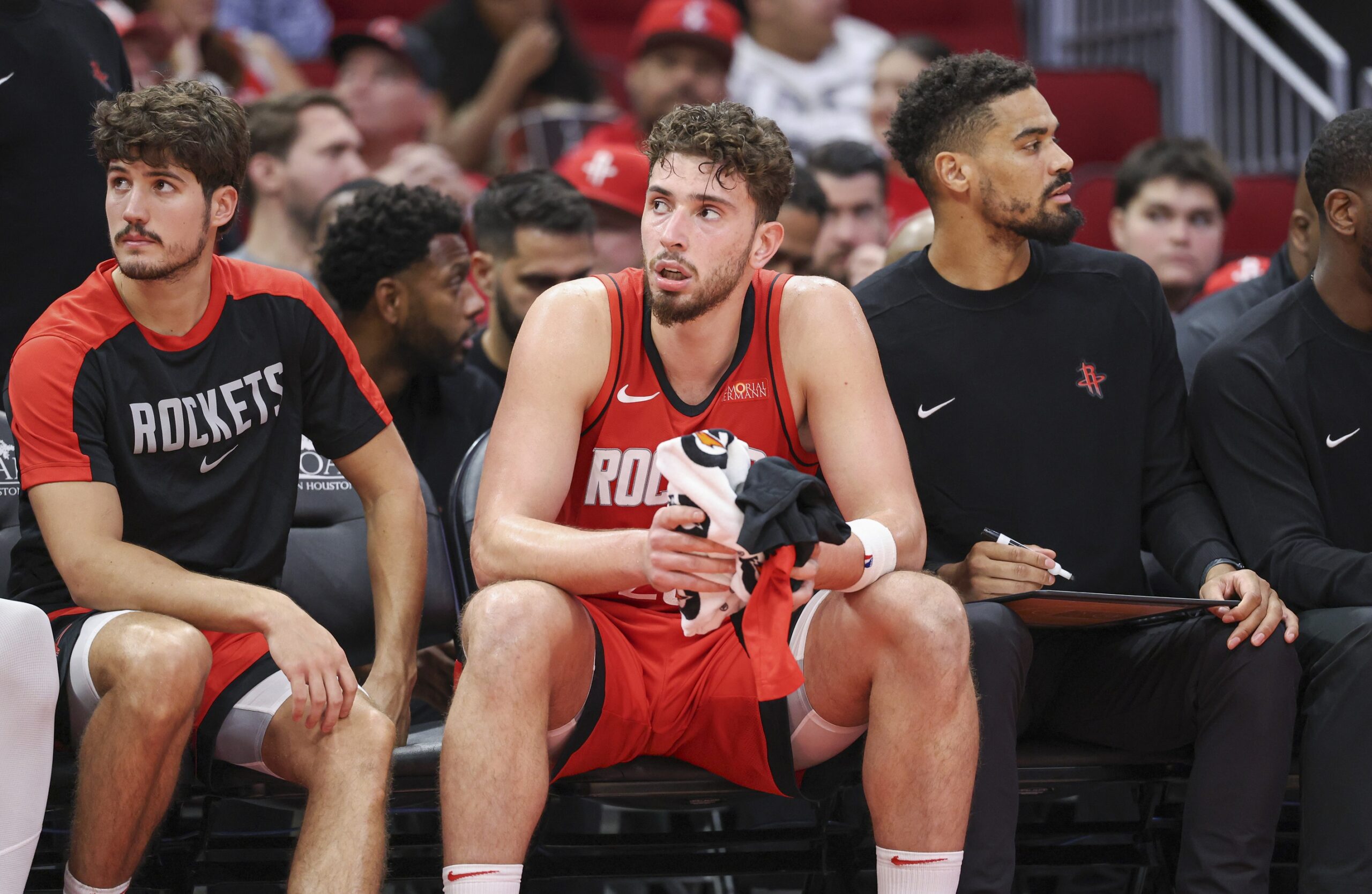 Houston Rockets center Alperen Sengun (28) reacts from the bench during the fourth quarter against the Charlotte Hornets at Toyota Center.