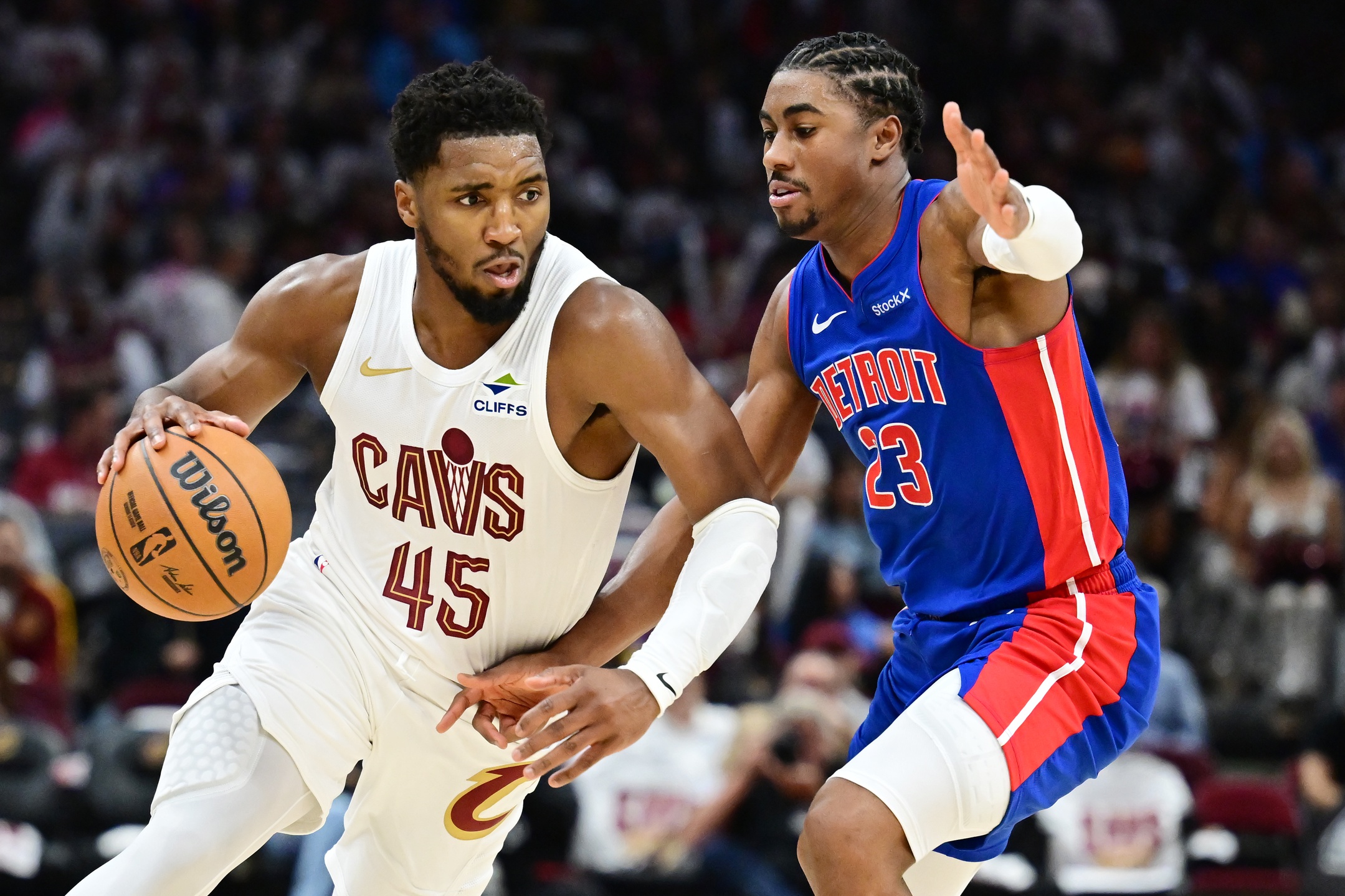 Cleveland Cavaliers guard Donovan Mitchell (45) drives to the basket against Detroit Pistons guard Jaden Ivey (23) during the second half at Rocket Mortgage FieldHouse.