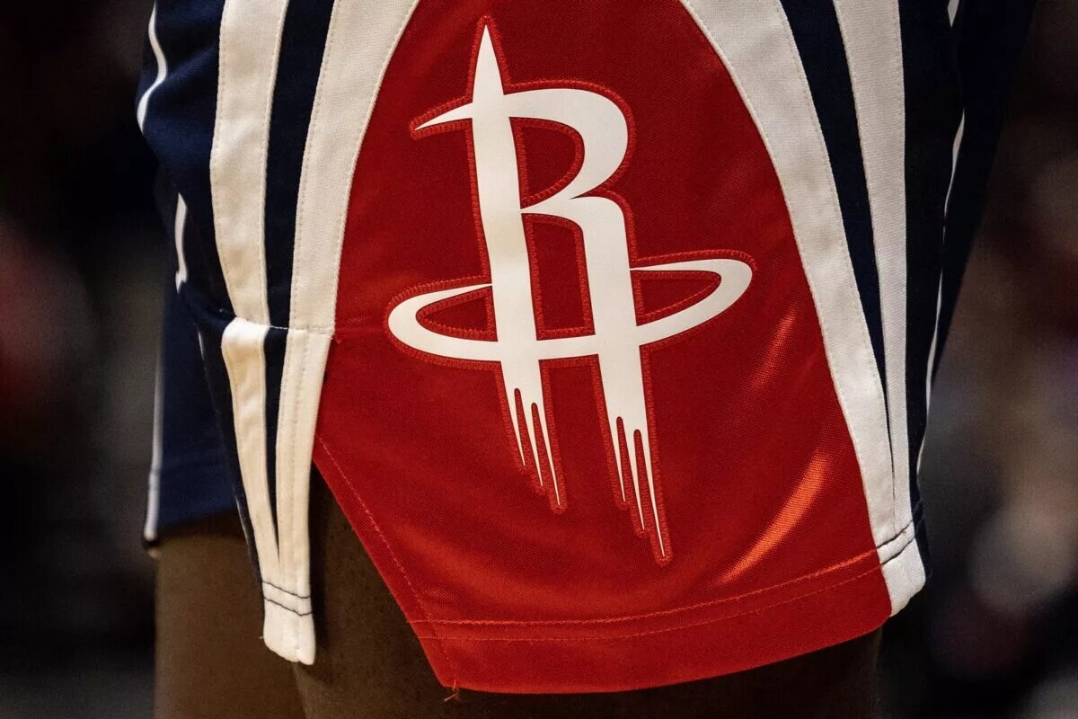 A detail of the Houston Rockets logo on the side of Houston Rockets jersey shorts