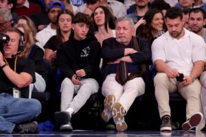 New York Knicks executive chairman James Dolan sits courtside