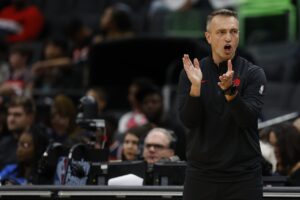 Toronto Raptors head coach Darko Rajakovic encourages his team from the sideline