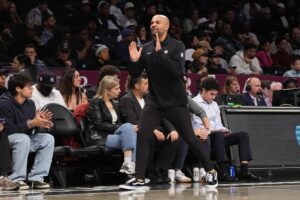 Brooklyn Nets head coach Jordi Fernandez motions to his players