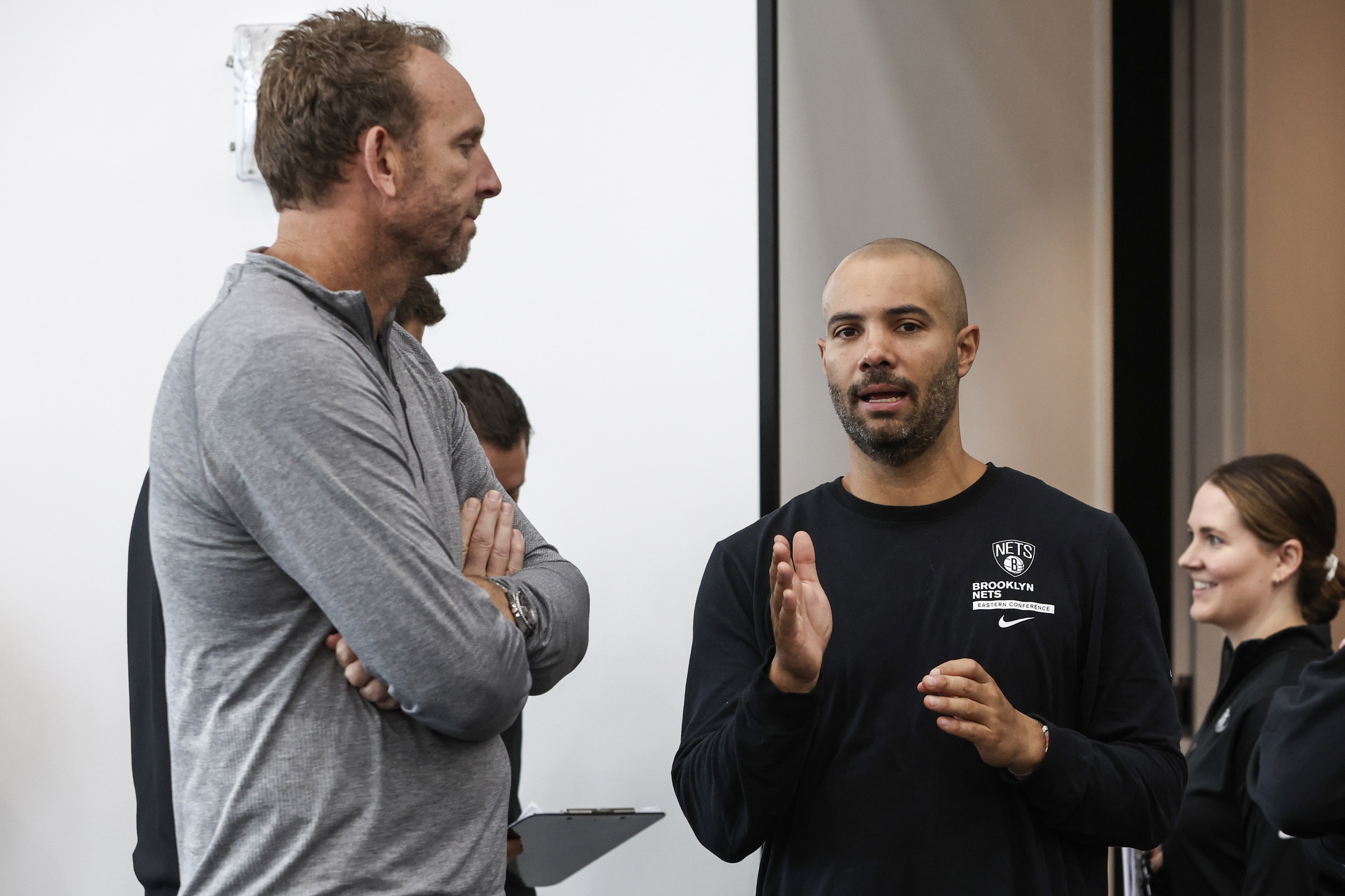 Brooklyn Nets General Manager Sean Marks (left) speaks to head coach Jordi Fernandez (right) during Media Day