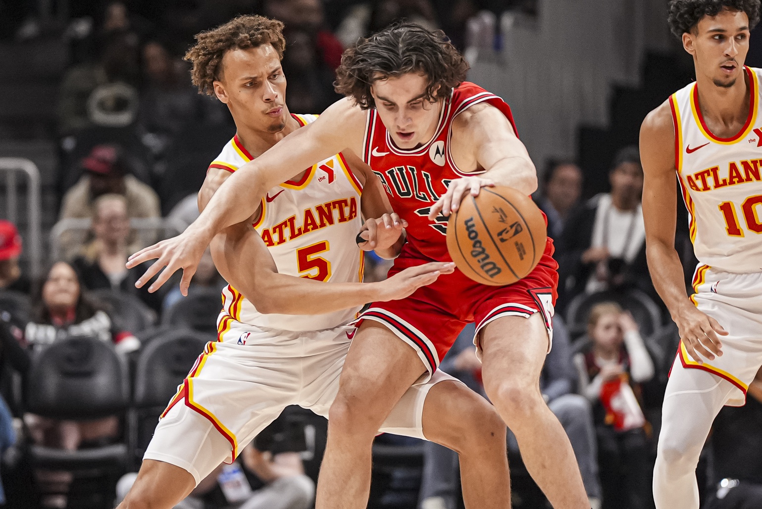 Atlanta Hawks guard Dyson Daniels (5) and Chicago Bulls guard Josh Giddey (3)