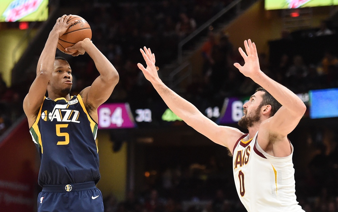 Utah Jazz guard Rodney Hood (5) shoots over the defense of Cleveland Cavaliers forward Kevin Love (0)