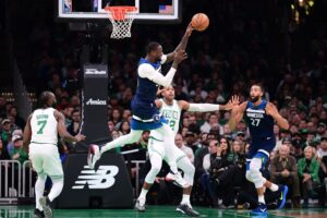 Minnesota Timberwolves forward Julius Randle (30) passes the ball during the first half against the Boston Celtics