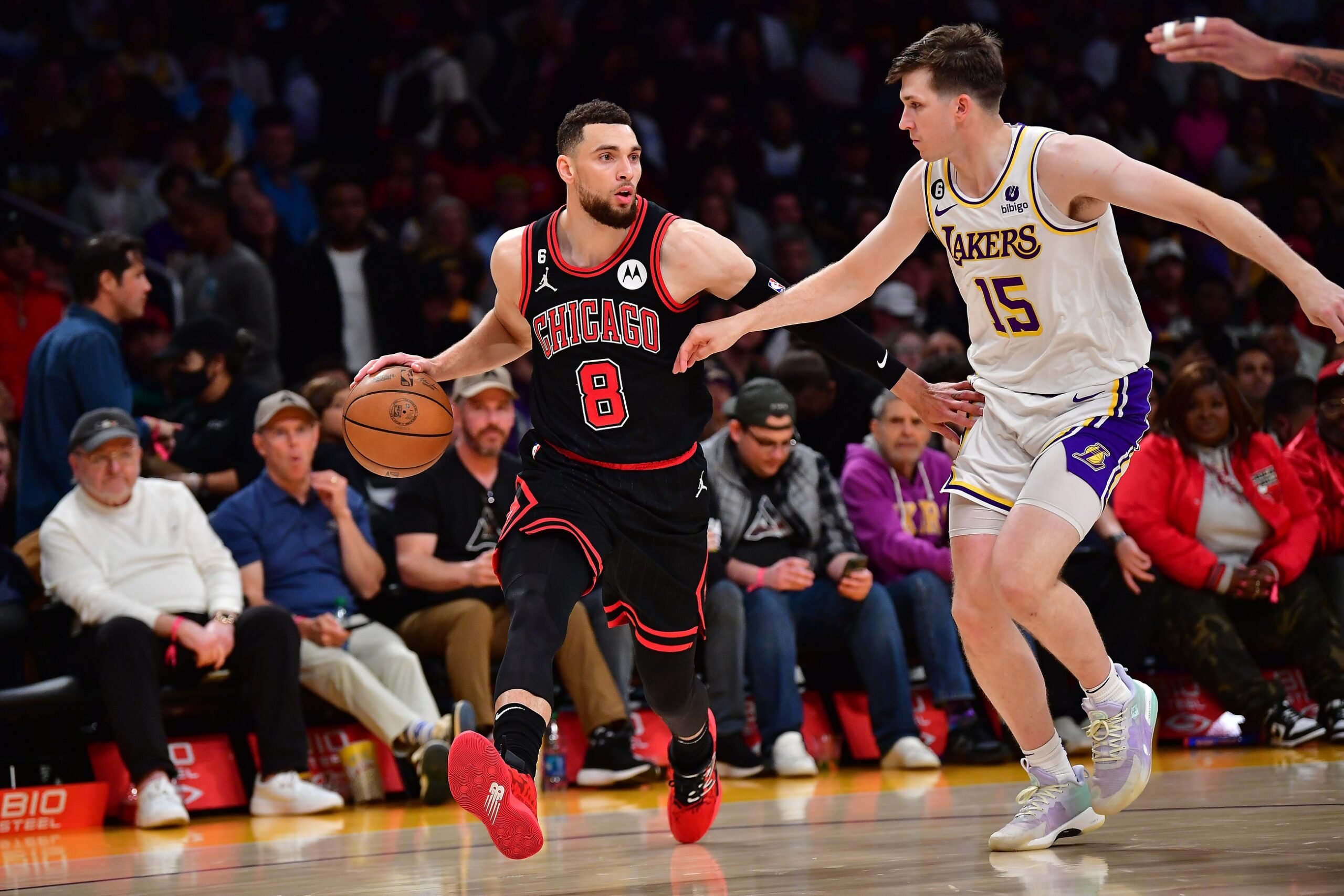 Chicago Bulls guard Zach LaVine (8) moves the ball up court against Los Angeles Lakers guard Austin Reaves (15)