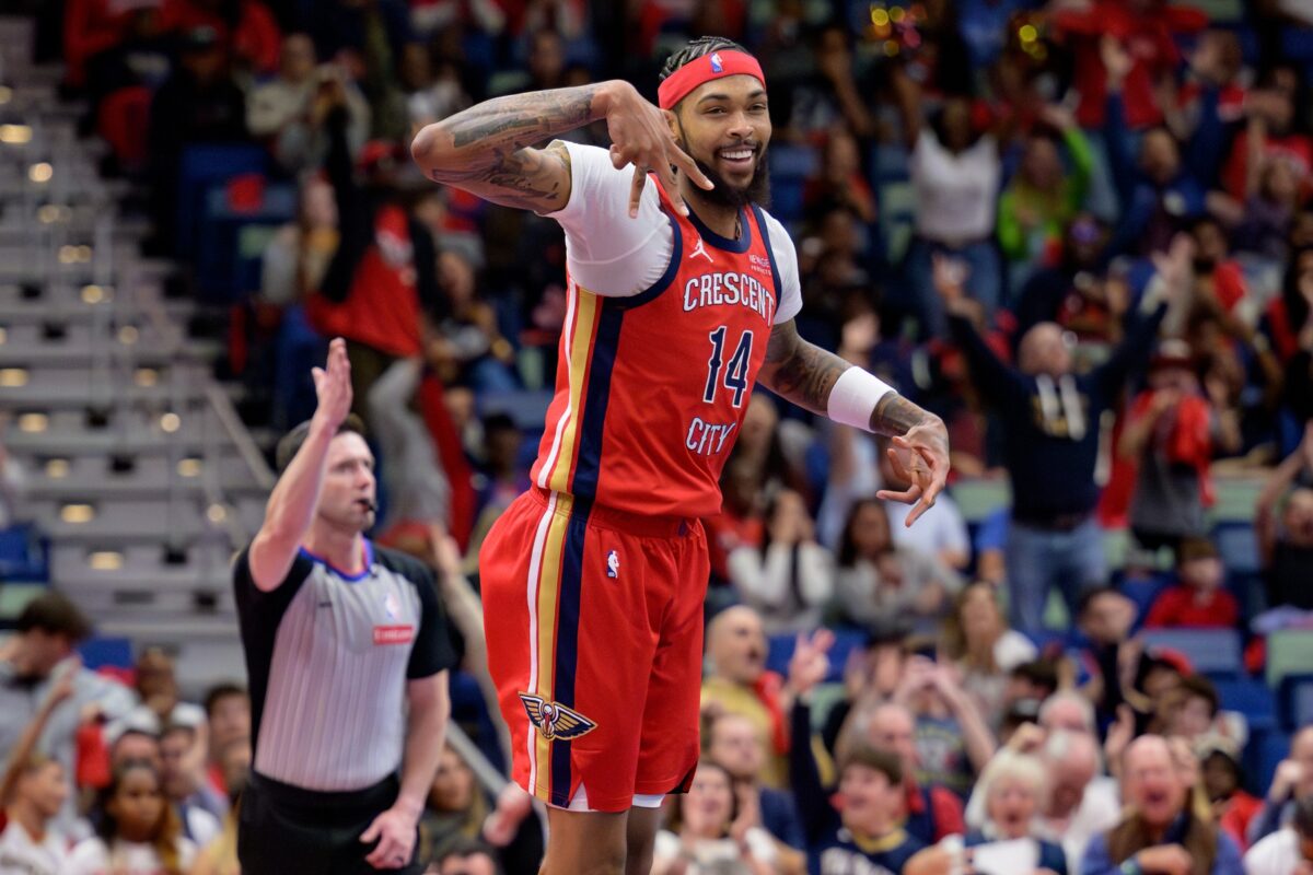 New Orleans Pelicans forward Brandon Ingram (14) celebrates a three