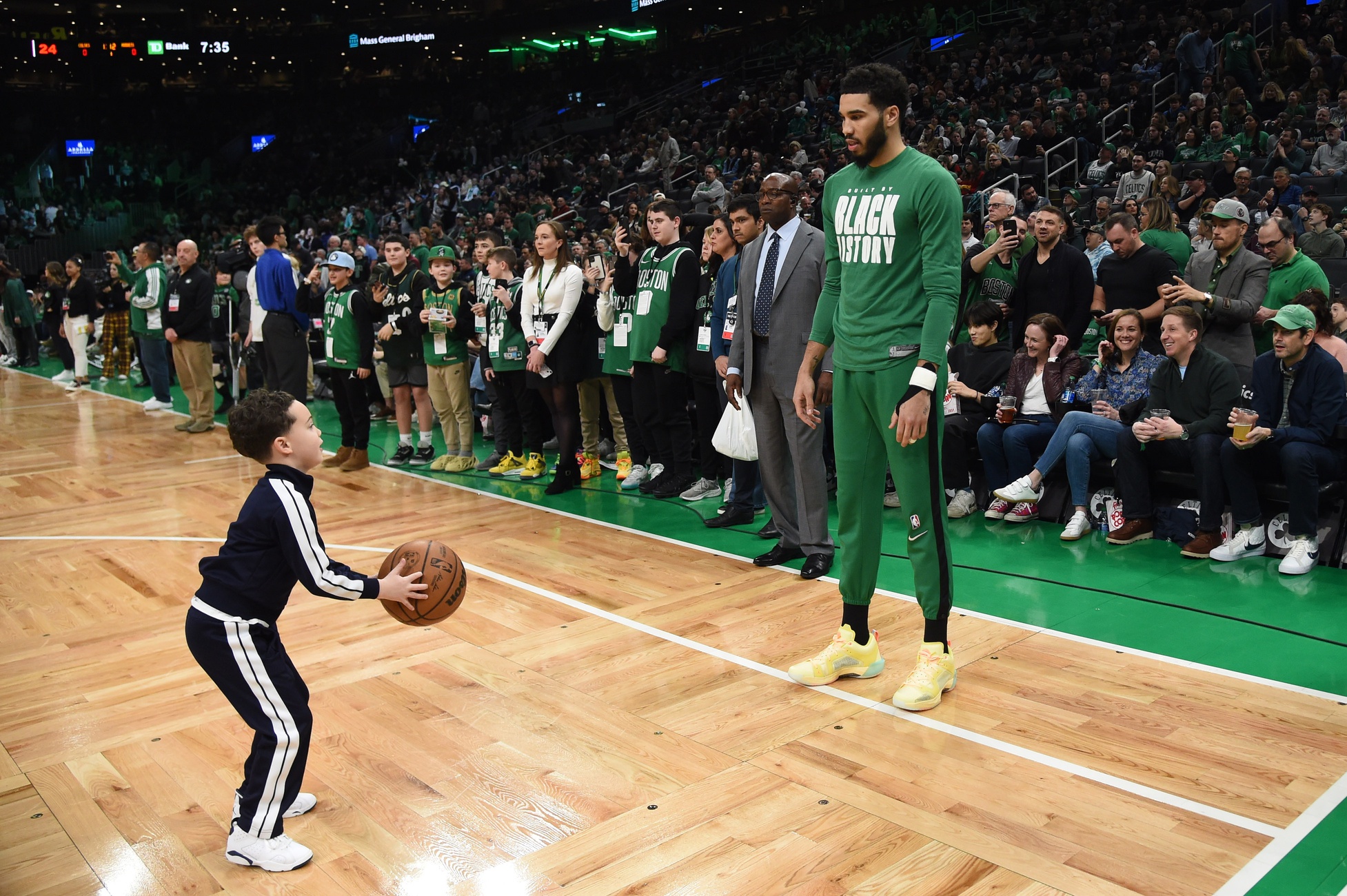 Feb 10, 2023; Boston, Massachusetts, USA; Boston Celtics forward Jayson Tatum (0) and his son Deuce prior to a game against the Charlotte Hornets at TD Garden. Mandatory Credit: Bob DeChiara-USA TODAY Sports