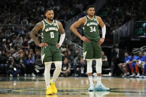 Mar 24, 2024; Milwaukee, Wisconsin, USA; Milwaukee Bucks forward Giannis Antetokounmpo (34) and guard Damian Lillard (0) during the game against the Oklahoma City Thunder at Fiserv Forum. Mandatory Credit: Jeff Hanisch-USA TODAY Sports