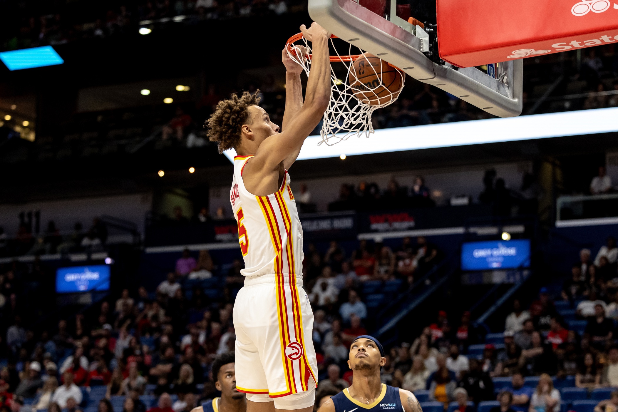 Atlanta Hawks guard Dyson Daniels (5) dunks the ball against the New Orleans Pelicans during the first half at Smoothie King Center.