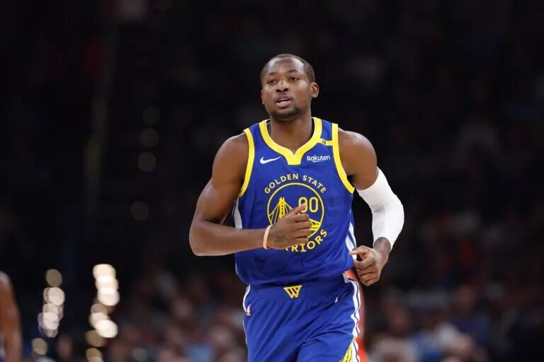 Nov 10, 2024; Oklahoma City, Oklahoma, USA; Golden State Warriors forward Jonathan Kuminga (00) runs down the court against the Oklahoma City Thunder during the second quarter at Paycom Center. Mandatory Credit: Alonzo Adams-Imagn Images