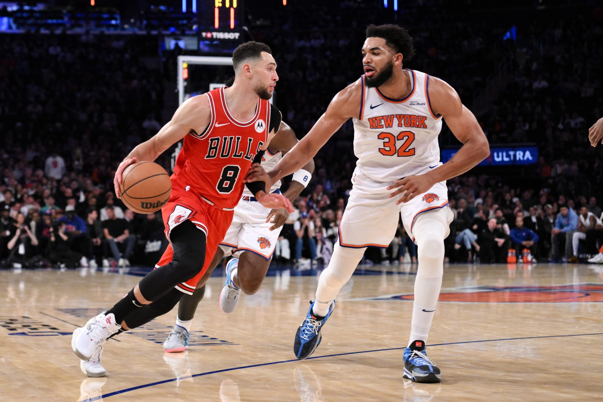 Nov 13, 2024; New York, New York, USA; Chicago Bulls guard Zach LaVine (8) drives to the basket while being defended by New York Knicks center Karl-Anthony Towns (32) during the second half at Madison Square Garden. Mandatory Credit: John Jones-Imagn Images