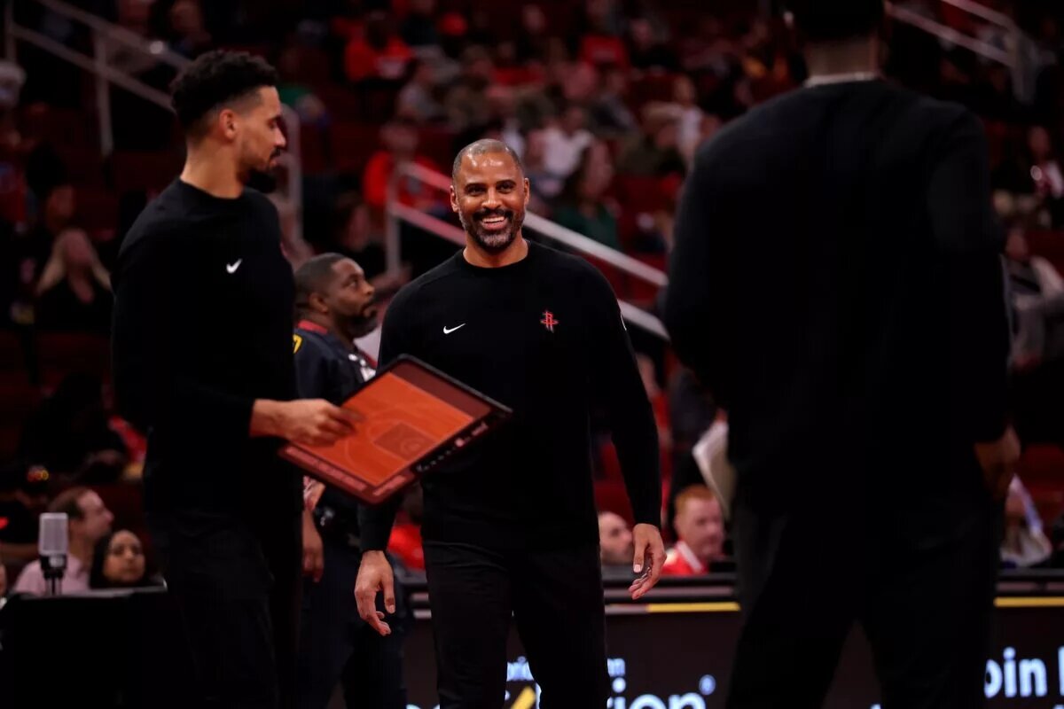 Nov 22, 2024; Houston, Texas, USA; Houston Rockets head coach Ime Udoka smiles during a timeout against the Portland Trailblazers during the third quarter at Toyota Center. Mandatory Credit: Erik Williams-Imagn Images