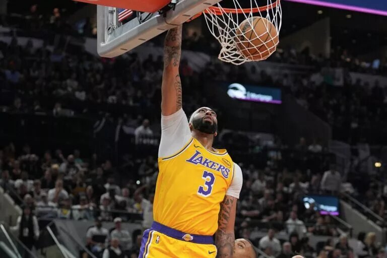 Nov 27, 2024; San Antonio, Texas, USA; Los Angeles Lakers forward Anthony Davis (3) dunks the ball in the second half against the San Antonio Spurs at Frost Bank Center. Mandatory Credit: Daniel Dunn-Imagn Images