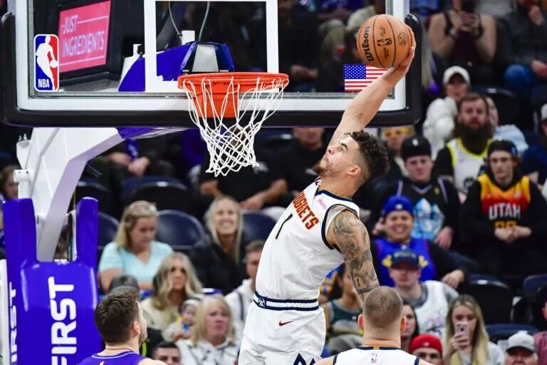 Denver Nuggets forward Michael Porter Jr. (1) dunks the ball